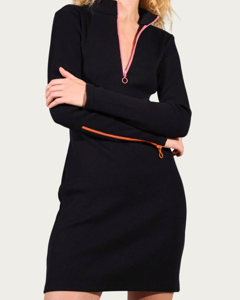 Front of a model wearing a size L Multicolor Zipper Ribbed-Knit Mock Neck Mini Dress in Black in Black by blonde gone rogue. | dia_product_style_image_id:335430
